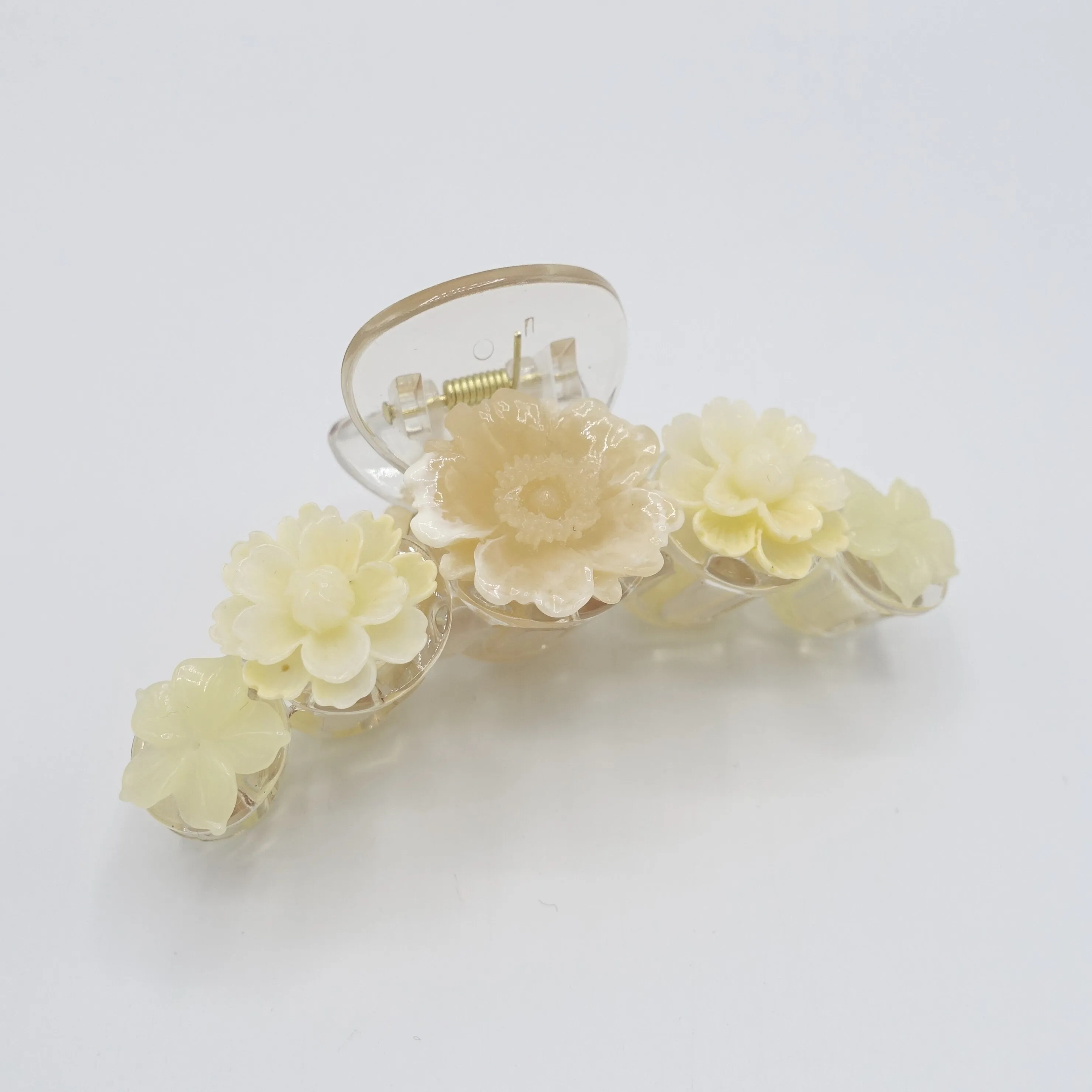 flower embellished hair claw