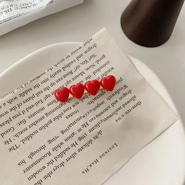Glossy Four Hearts Clip